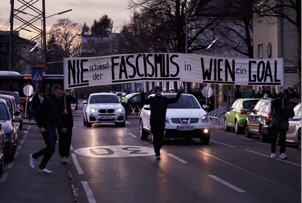 NIE SCHIESST DER FASCISMUS IN WIEN EIN GOAL!. Performance in public space by God's Entertainment & Karl Wratschko. Photo: Peter Mayr